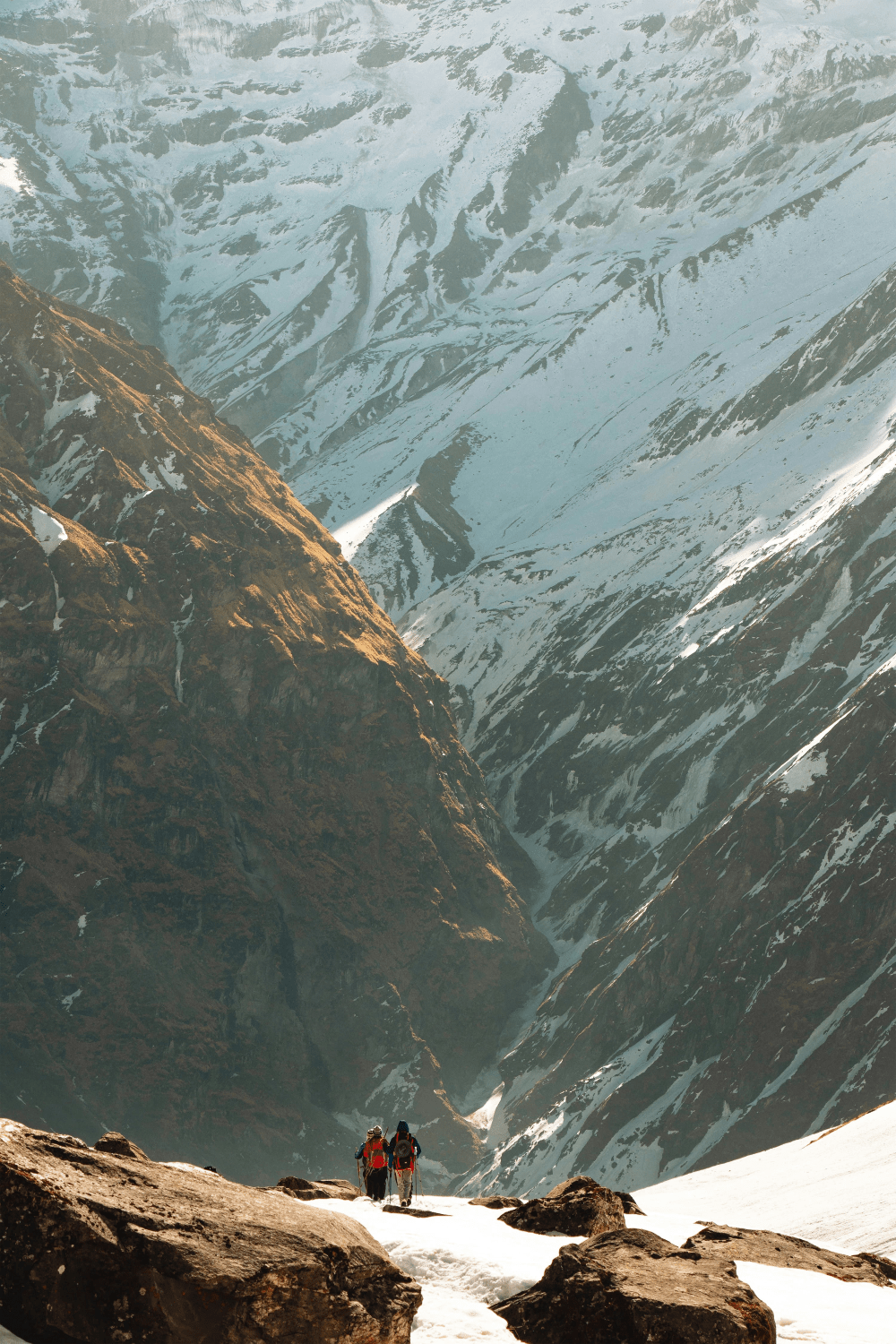 two-trekkers-hiking-toward-deurali-after-the-base-camp.png