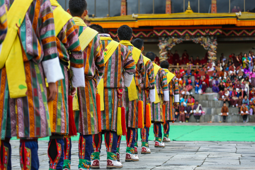 Bhutan Traditional Attire During A Tsechu